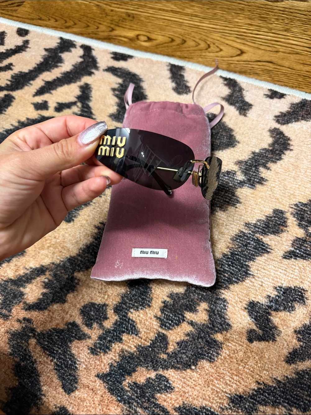 Miu Miu MUA51S oval-frame sunglasses